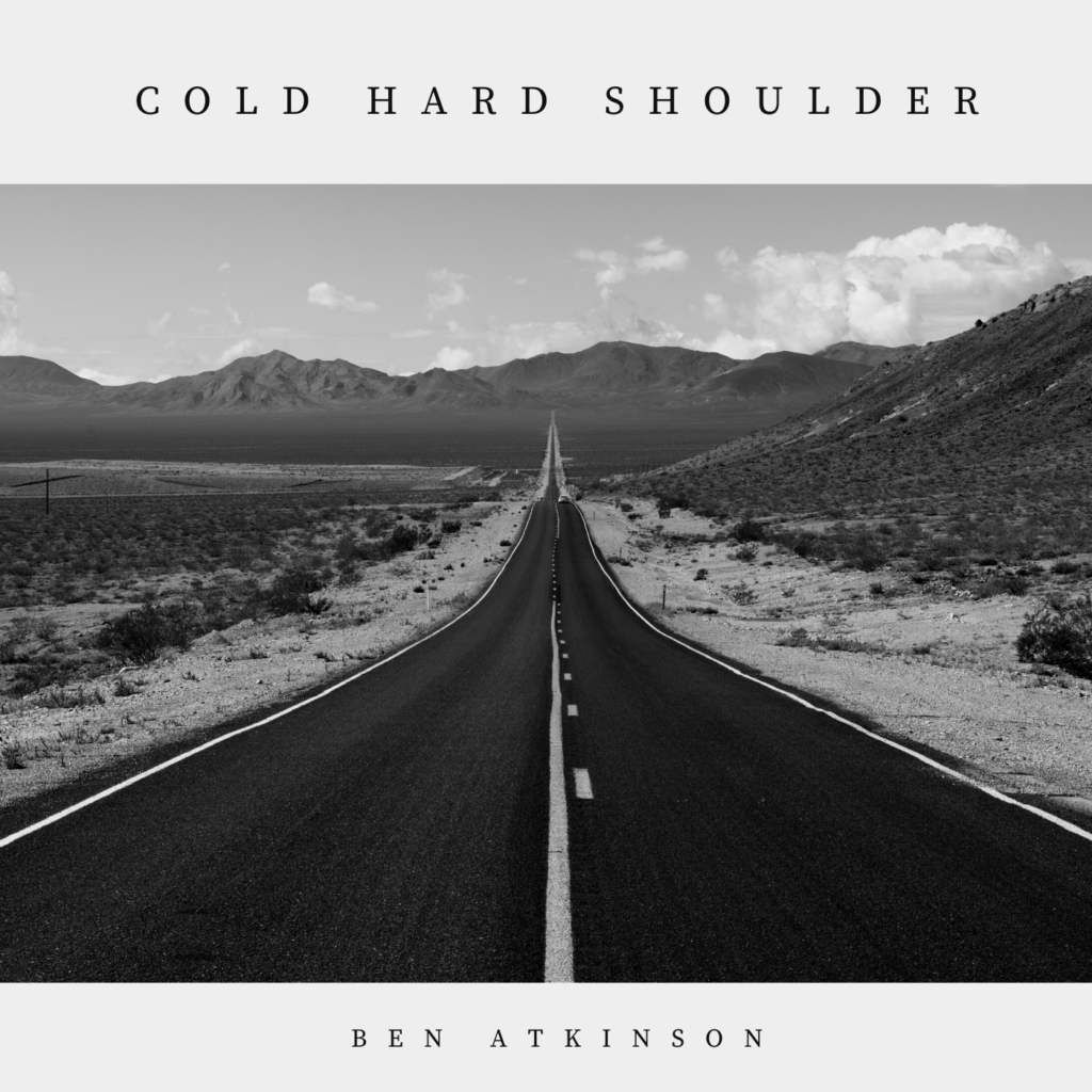 A long straight country road, running through the desert. The Album cover for Ben's album Cold Hard Shoulder.